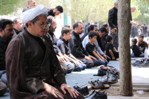 گزارش تصویری/ نماز ظهر تاسوعای حسینی در قم