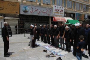 گزارش تصویری/ نماز ظهر عاشورا در قم