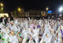 برگزاری جشن تکلیف دانش‌آموزان دختر الیگودرز در جوار مزار شهدای گمنام